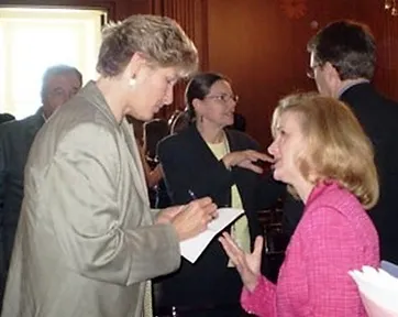 Rhoda co-hosted with Karen Hughes, then White House Director of Communications, a State Department public diplomacy program where both spoke to members of Congress.