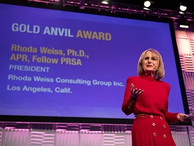 Rhoda Weiss giving acceptance speech for the PRSA Gold Anvil Award